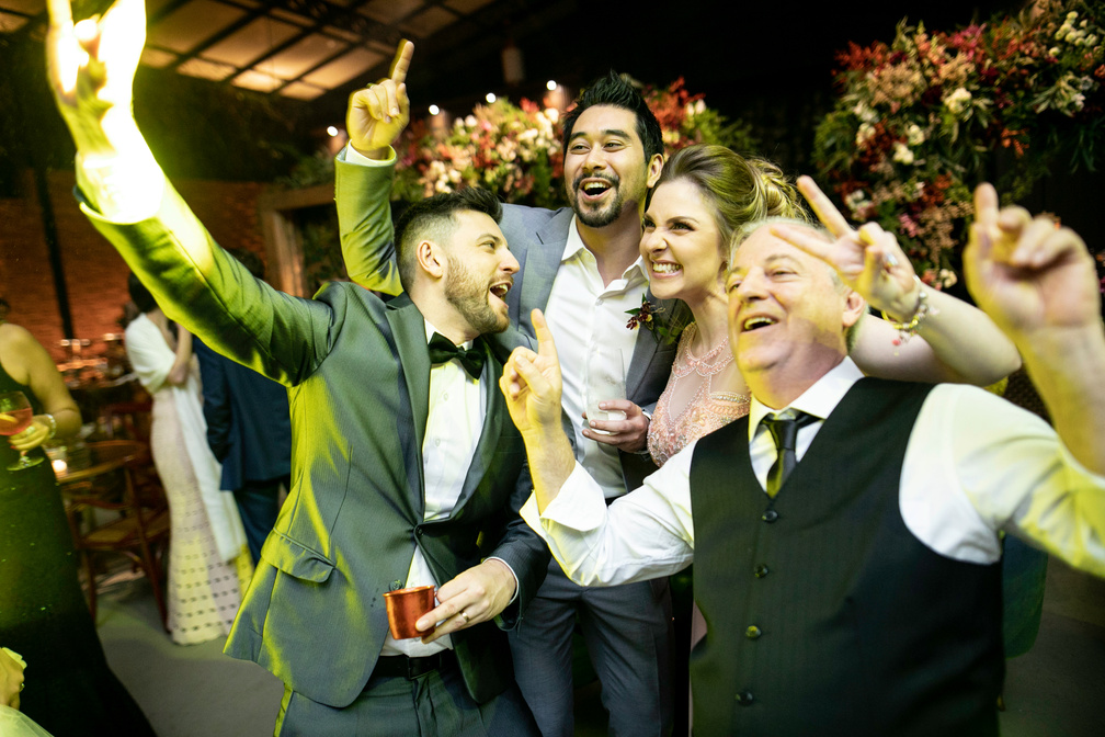 Men dancing and enjoying a wedding party